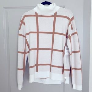 Brand New, 89th and Madison, camel/cream sweater.